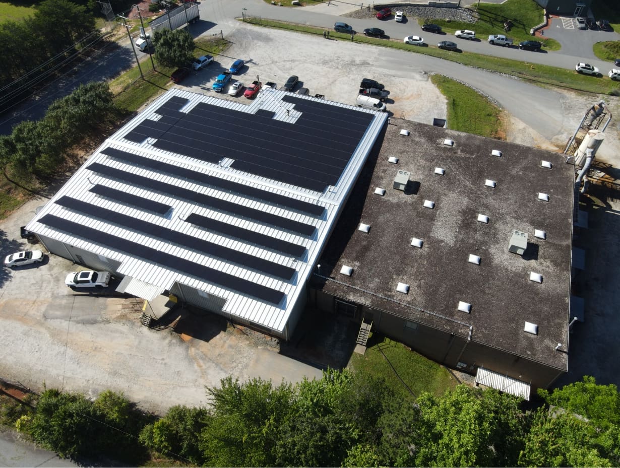 Solar panel design completed on an industrial warehouse building